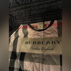 Burberry rain coat.